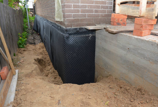 Happy homeowners after waterproofing job in Birchwood